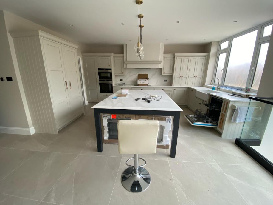 Modern kitchen renovation with light tiling