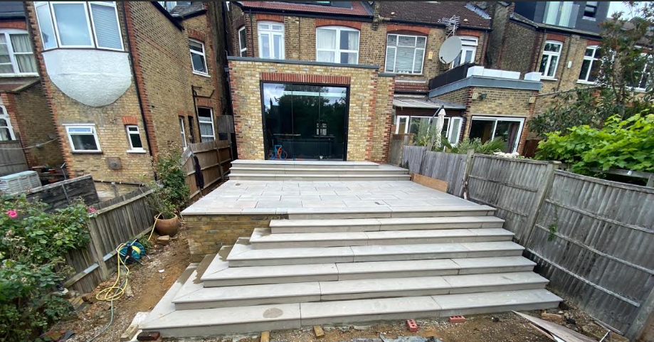 Garden patio with natural stone steps and tiling