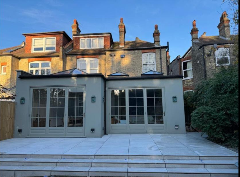 Modern driveway with slate patio tiling